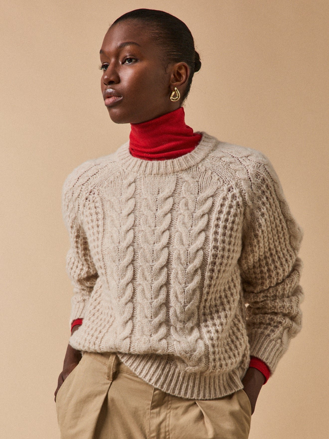 Women's merino wool blend cable-knit sweater